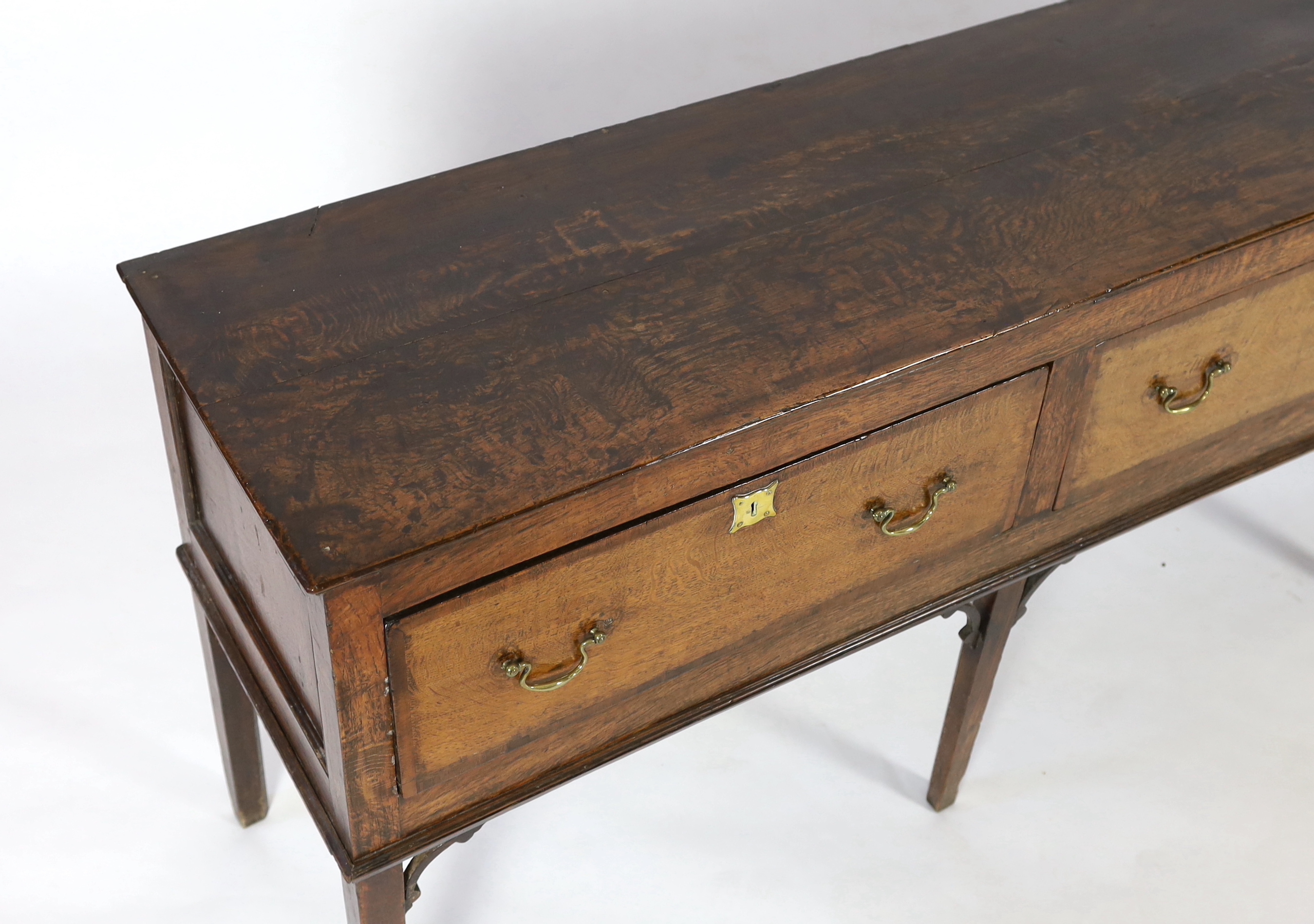 A mid 18th century oak dresser base